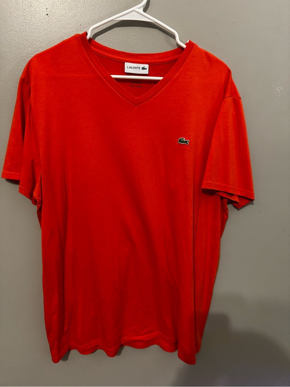 Lacoste Men's V-Neck Polo Tee in Bright orange and with Green Crocodile